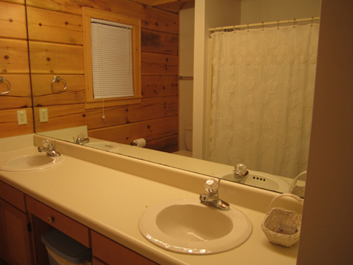 Cable TV, Hot tub, trash pick up, Two queen-size beds includes linens, bathroom shower/tub & two sinks, hairdryer, towels & wash clothes, kitchen includes range, refrigerator, microwave, toaster, coffeemaker | Highland Glade Cabin Rentals | Gatlinburg, TN